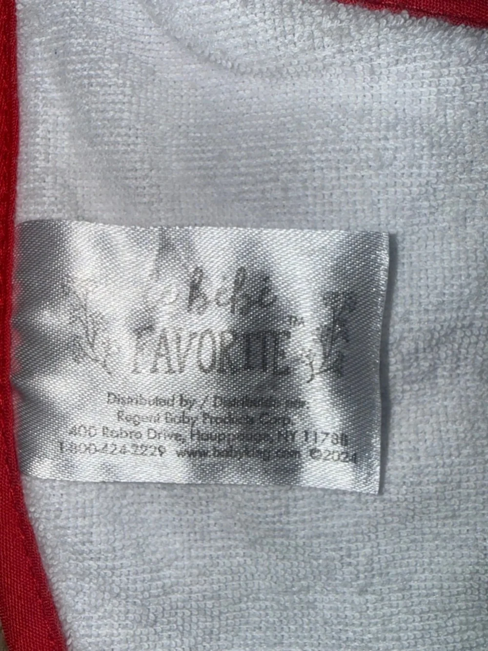 4 baby bibs with embroidered text and graphics